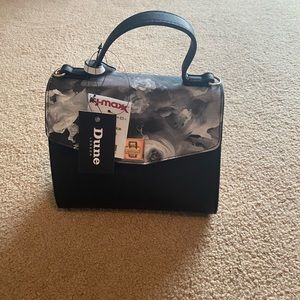 Brand new cute purse. Going to match it with my hat I am selling for a wedding.